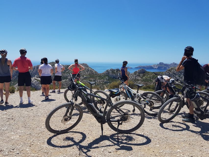 From Marseille: Calanques National Park E-Mountain Bike Tour - Montagne de l’Aigle trails and the reality of steep climbs