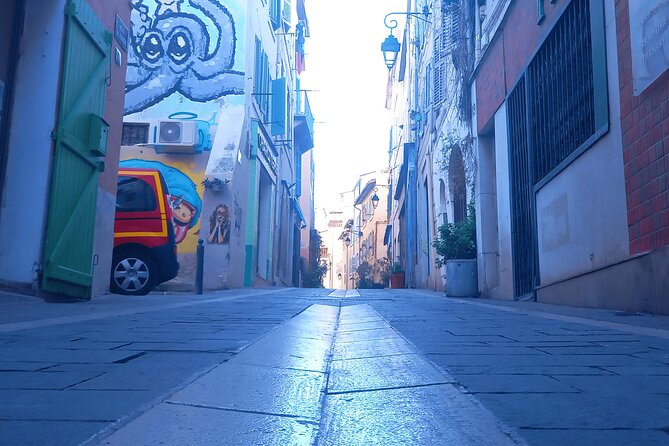 Marseille Guided Tour for 2.5 Hours with a Bilingual Local Guide - Abbaye Saint Victor: Romanesque calm and the story behind la Navette