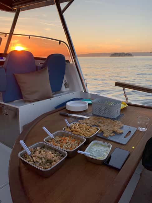 Marseille: Sunset Boat Cruise with Dinner and Drinks - Dinner at sea: vegetarian buffet, focaccia, and Provence rosé